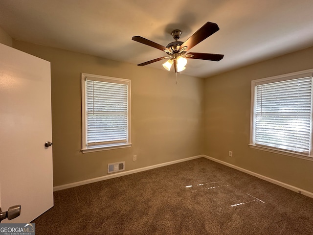 carpeted empty room with ceiling fan