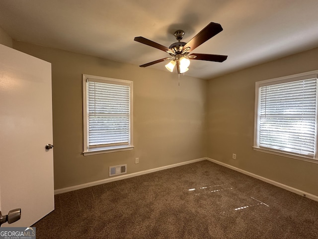1581 Hollyhock Ter, Decatur, GA 30032 - empty room featuring ceiling fan, carpet floors, and baseboards