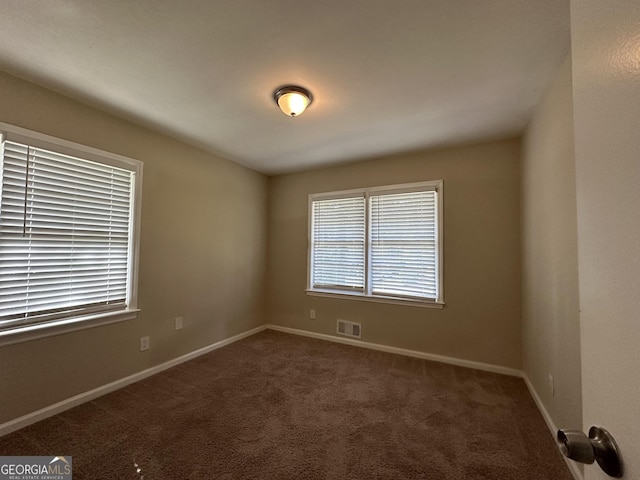 1581 Hollyhock Ter, Decatur, GA 30032 - carpeted spare room featuring baseboards
