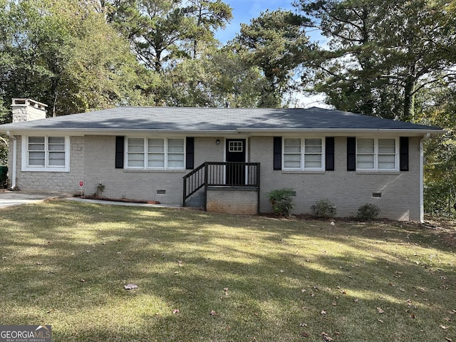 1581 Hollyhock Ter, Decatur, GA 30032 - ranch-style home with crawl space, brick siding, a front lawn, and a chimney