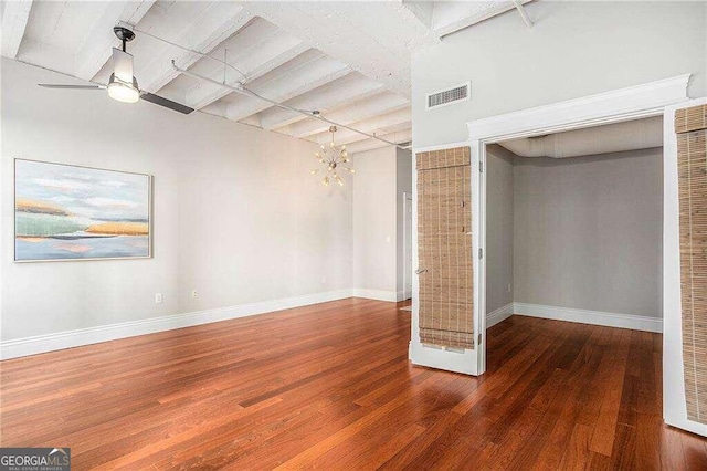 unfurnished bedroom featuring ceiling fan and dark hardwood / wood-style flooring