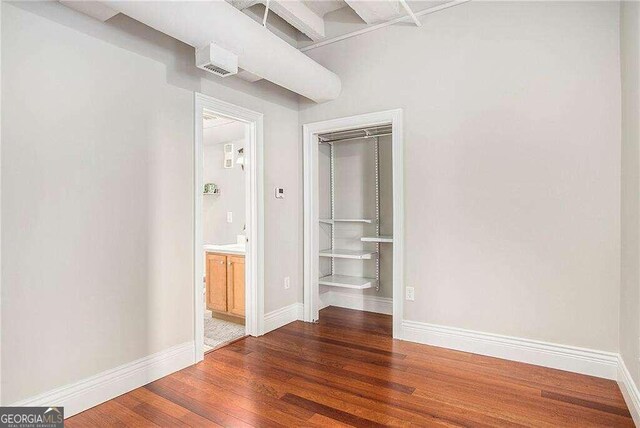 interior space with dark hardwood / wood-style flooring