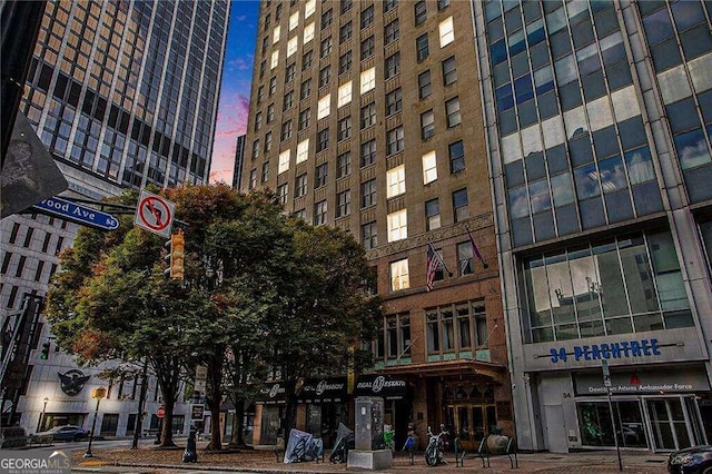 view of outdoor building at dusk