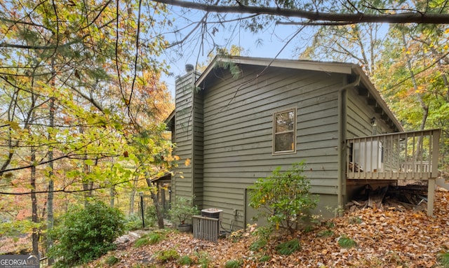 view of home's exterior featuring a deck