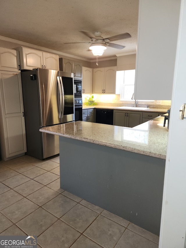 kitchen featuring black appliances, sink, ceiling fan, ornamental molding, and kitchen peninsula