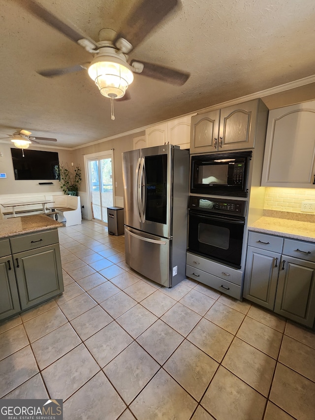 kitchen featuring gray cabinetry, light tile patterned floors, black appliances, and ornamental molding