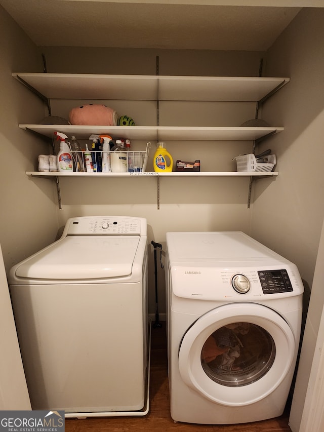 laundry room with washer and dryer