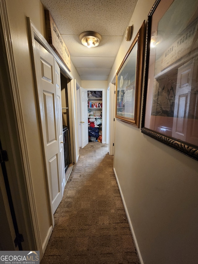 hallway with carpet