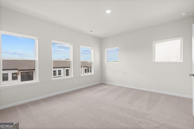 view of carpeted spare room