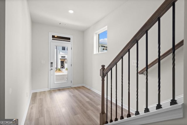 foyer entrance featuring light wood-type flooring