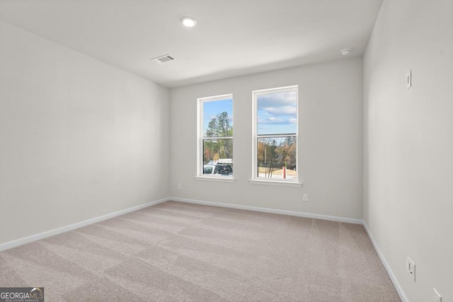 view of carpeted spare room