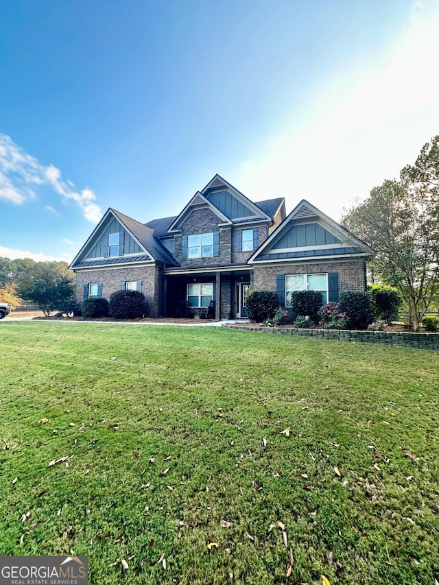 view of front of property with a front lawn