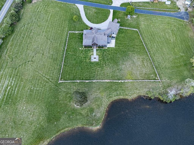 drone / aerial view featuring a water view