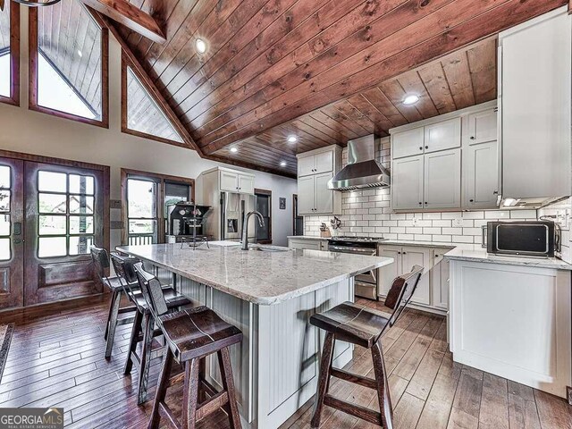 42 Lone Pine Dr, Morganton, GA 30560 - kitchen with wall chimney range hood, stainless steel appliances, wooden ceiling, a sink, and dark wood-style floors