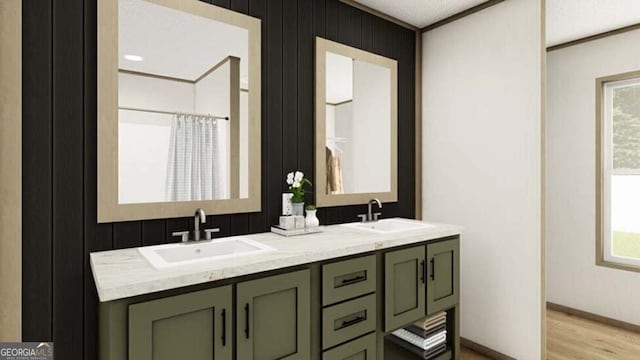 651 Boulevard St, Folkston, GA 31537 - bathroom featuring double vanity, wood finished floors, ornamental molding, baseboards, and curtained shower