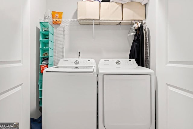 washroom featuring separate washer and dryer