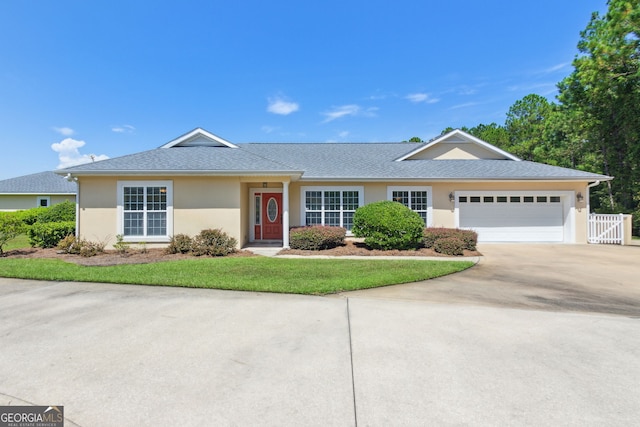 ranch-style home with a garage