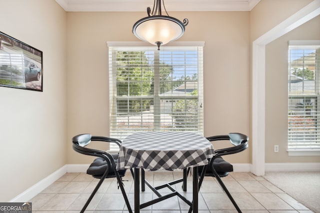 tiled dining space with ornamental molding