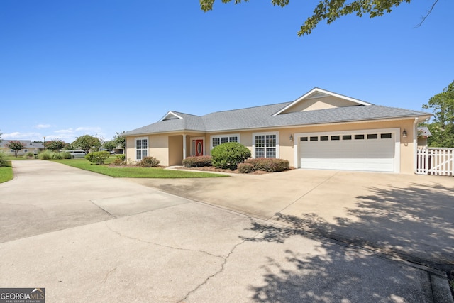 ranch-style home with a garage