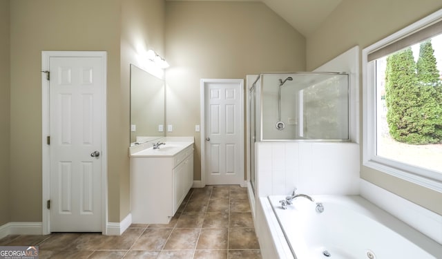 bathroom featuring vanity, high vaulted ceiling, a wealth of natural light, and independent shower and bath