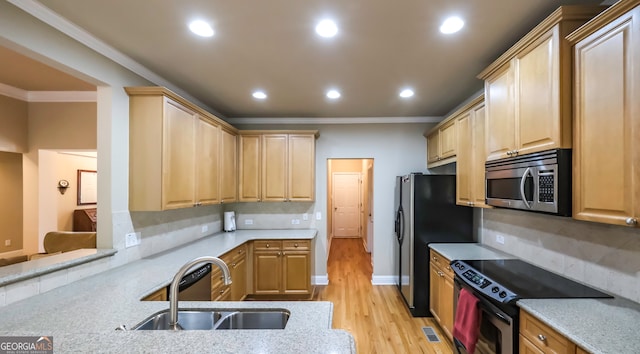 kitchen with sink, stainless steel appliances, crown molding, light brown cabinetry, and light wood-type flooring