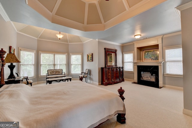 bedroom with multiple windows, carpet flooring, and ornamental molding