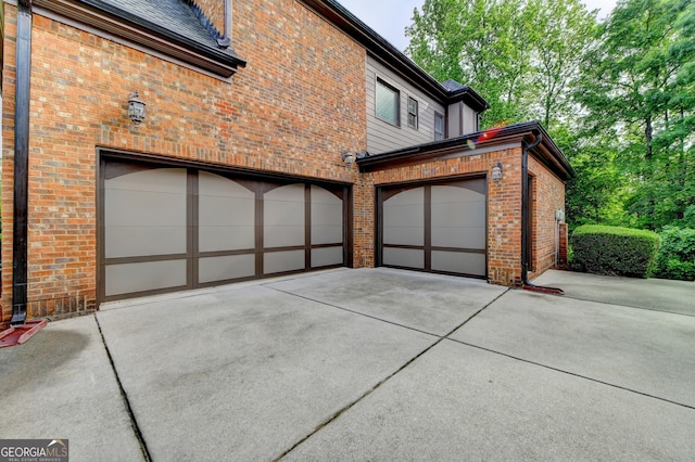 view of home's exterior with a garage