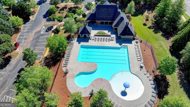 view of swimming pool with a patio area