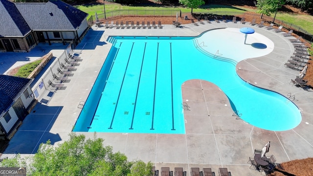 view of swimming pool featuring a patio