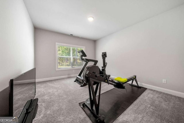 exercise room with carpet floors