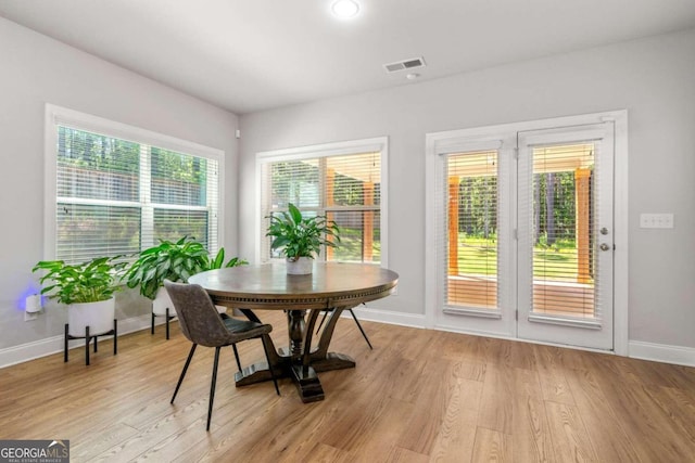 dining area featuring light hardwood / wood-style flooring