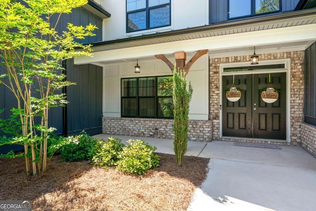 doorway to property with a porch