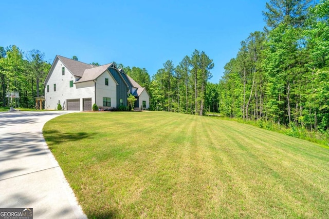 view of yard with a garage