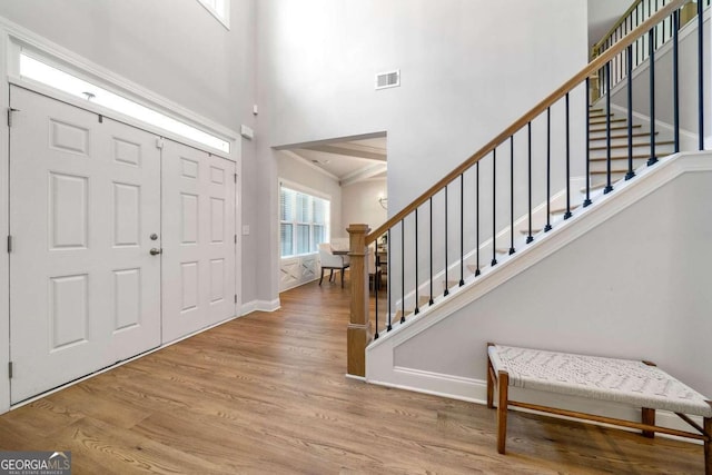 entrance foyer with light hardwood / wood-style flooring