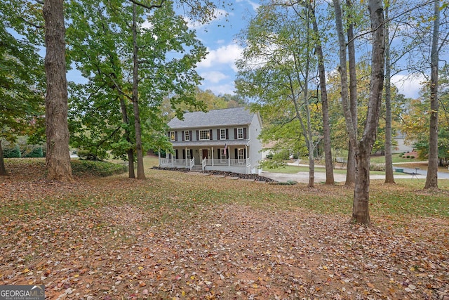 colonial inspired home with a porch