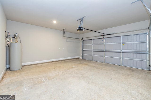 garage with a garage door opener and gas water heater