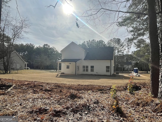 rear view of property featuring a patio