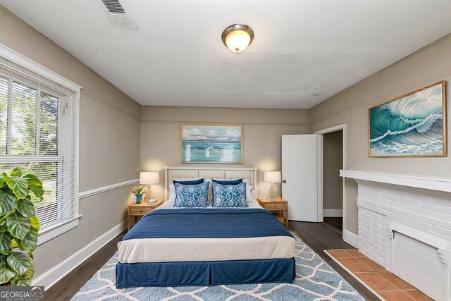 bedroom featuring dark hardwood / wood-style floors