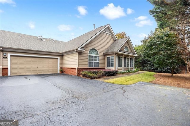 view of front of home featuring a garage