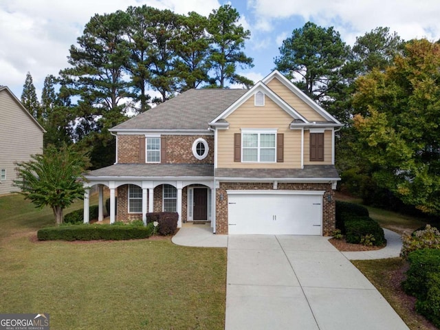 view of front of house featuring a garage and a front yard