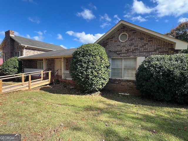 view of front of home with a front yard