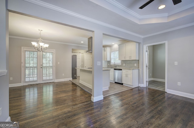 kitchen featuring french doors, backsplash, dishwasher, white cabinets, and dark hardwood / wood-style floors