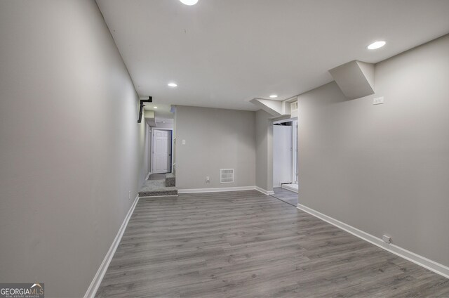 1204 Westridge Rd SW, Atlanta, GA 30311 - finished below grade area with wood finished floors, baseboards, and recessed lighting