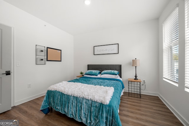 bedroom featuring dark hardwood / wood-style floors