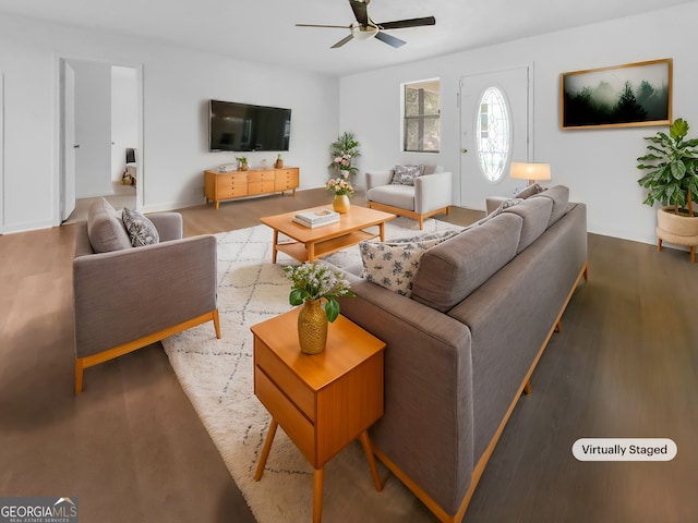 living room with hardwood / wood-style floors and ceiling fan