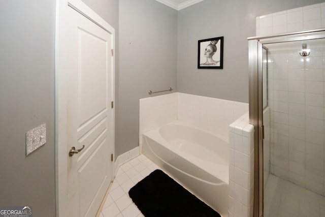 bathroom with tile patterned floors, ornamental molding, and separate shower and tub