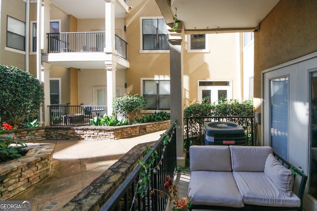 799 Hammond Dr Unit 116, Atlanta, GA 30328 - balcony with an outdoor living space