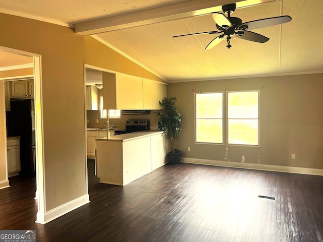 kitchen with stainless steel range with electric cooktop, vaulted ceiling with beams, a textured ceiling, dark wood-type flooring, and kitchen peninsula