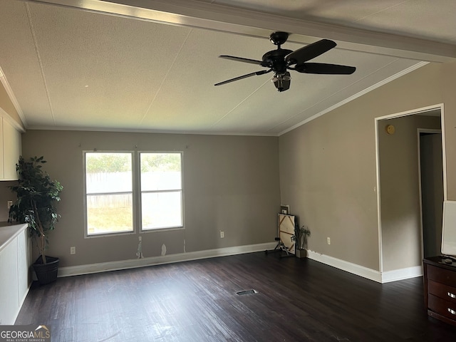 empty room with dark wood-type flooring, ceiling fan, vaulted ceiling with beams, and ornamental molding