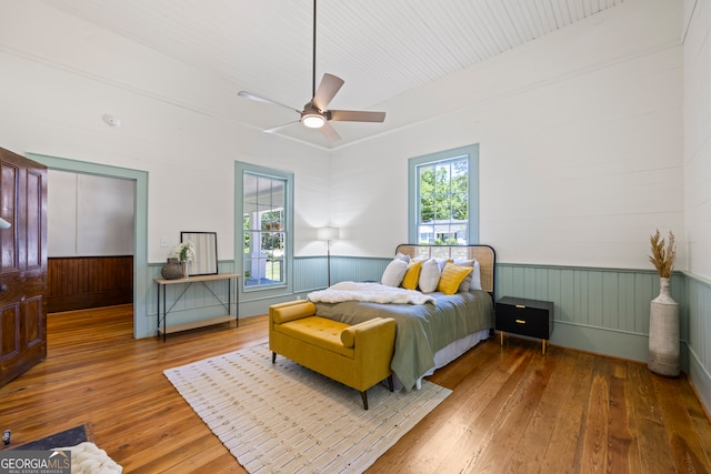 bedroom featuring ceiling fan and hardwood / wood-style flooring